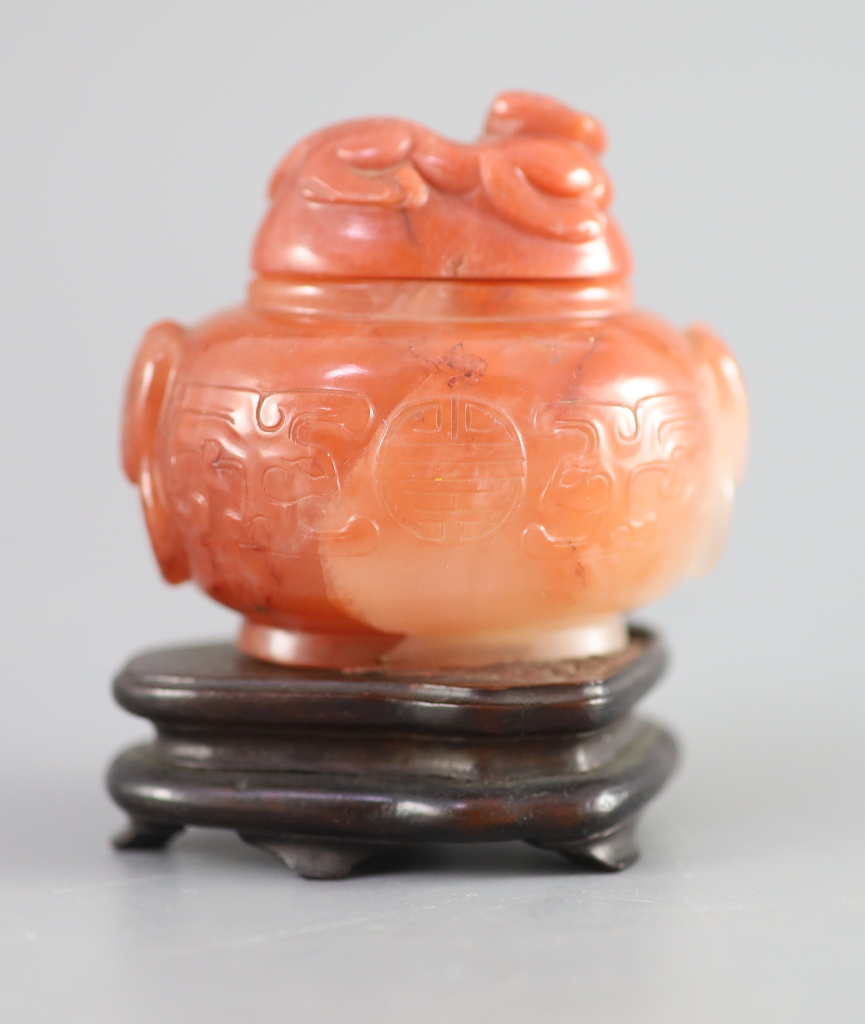 A small Chinese cornelian jar and cover, Qing dynasty, 18th/19th century, height 2.5in.